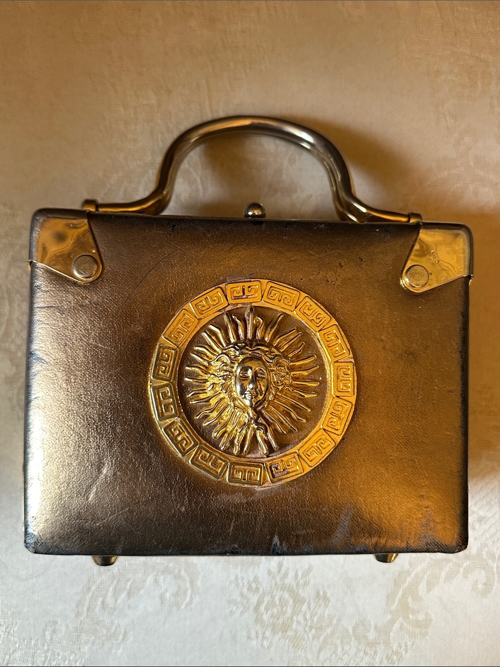 Retro gold box style handbag w/Medusa sun, sunburst logo, very unique